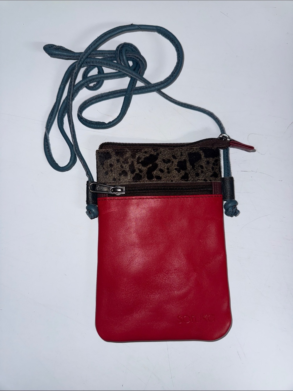 Compact Red Leather Crossbody with Leopard Accent and Blue Strap